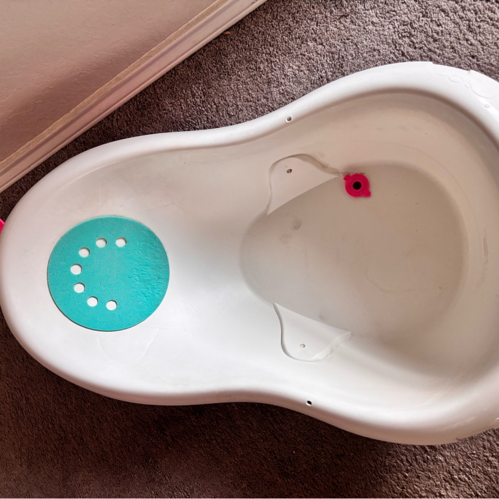 White Baby Bath Tub with Teal and Pink Accents
